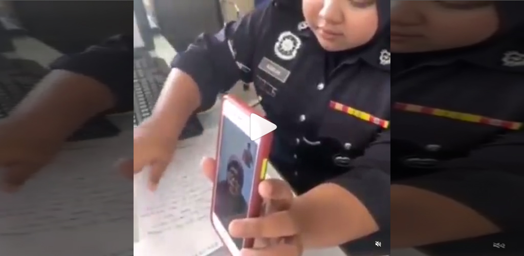 [VIDEO] Anggota polis gigih cari jurubahasa bantu OKU buat laporan dipuji