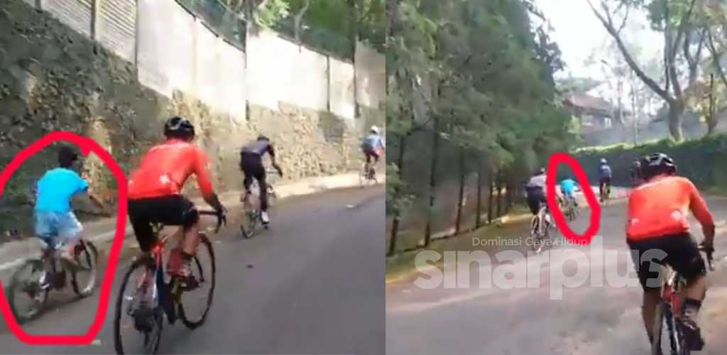 [VIDEO] Cyclist persis pelumba profesional dikalahkan dengan seorang budak ketika membuat pendakian